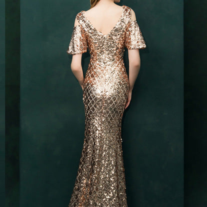 Robe de soirée à paillettes dorées