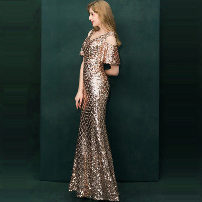 Robe de soirée à paillettes dorées