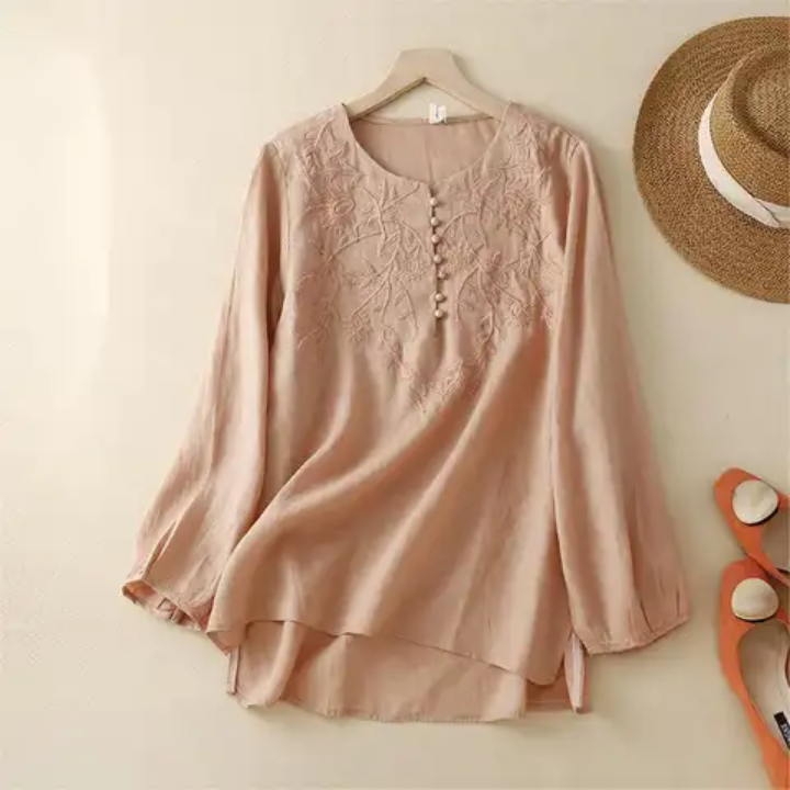 Délicate blouse en lin à broderie
