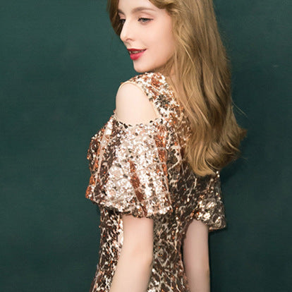 Robe de soirée à paillettes dorées