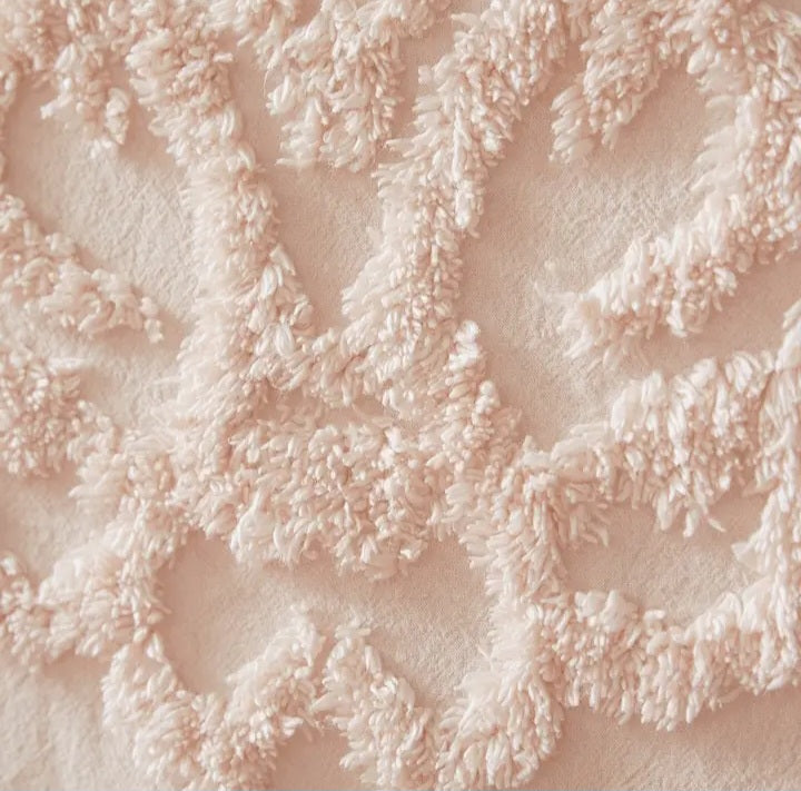 Couverture à franges rose, motif bohème