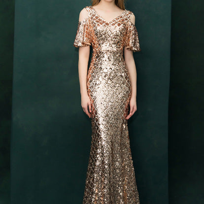 Robe de soirée à paillettes dorées