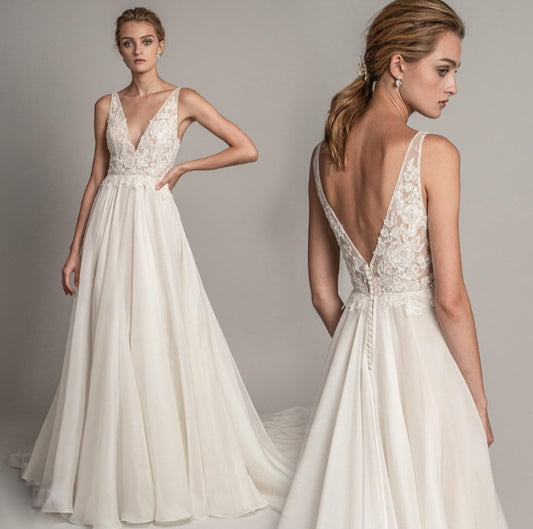 Robe de mariée en chiffon blanc à decolleté